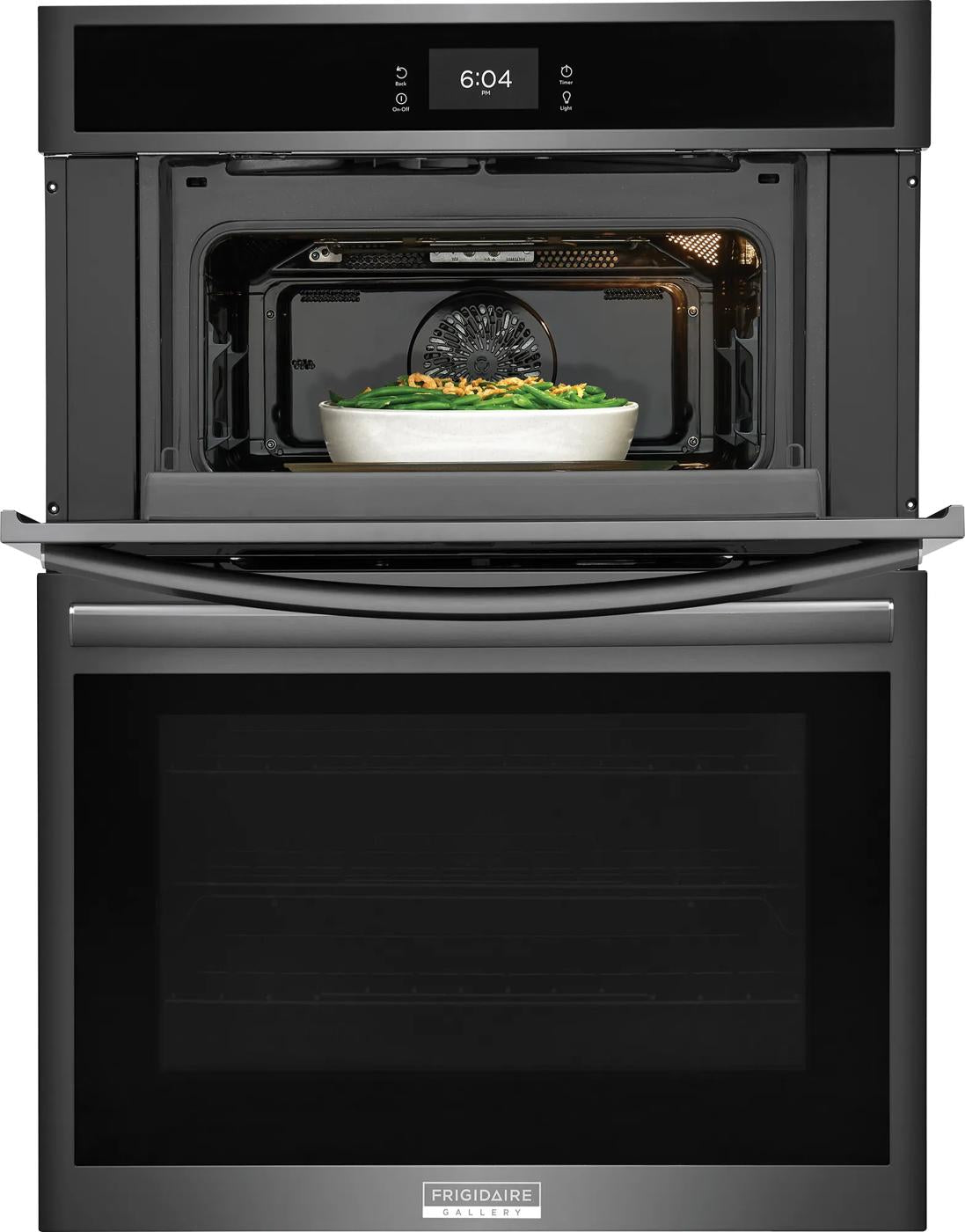 Black electric wall oven and microwave combo with digital display and casserole dish inside microwave cavity