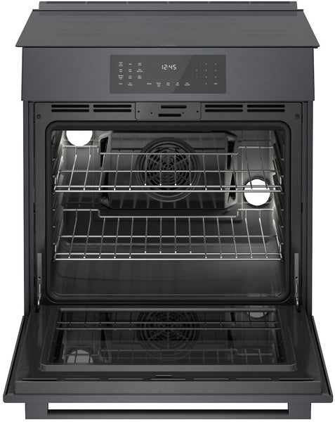 Black stainless steel induction oven with touch control panel and dual wire racks in kitchen appliances collection