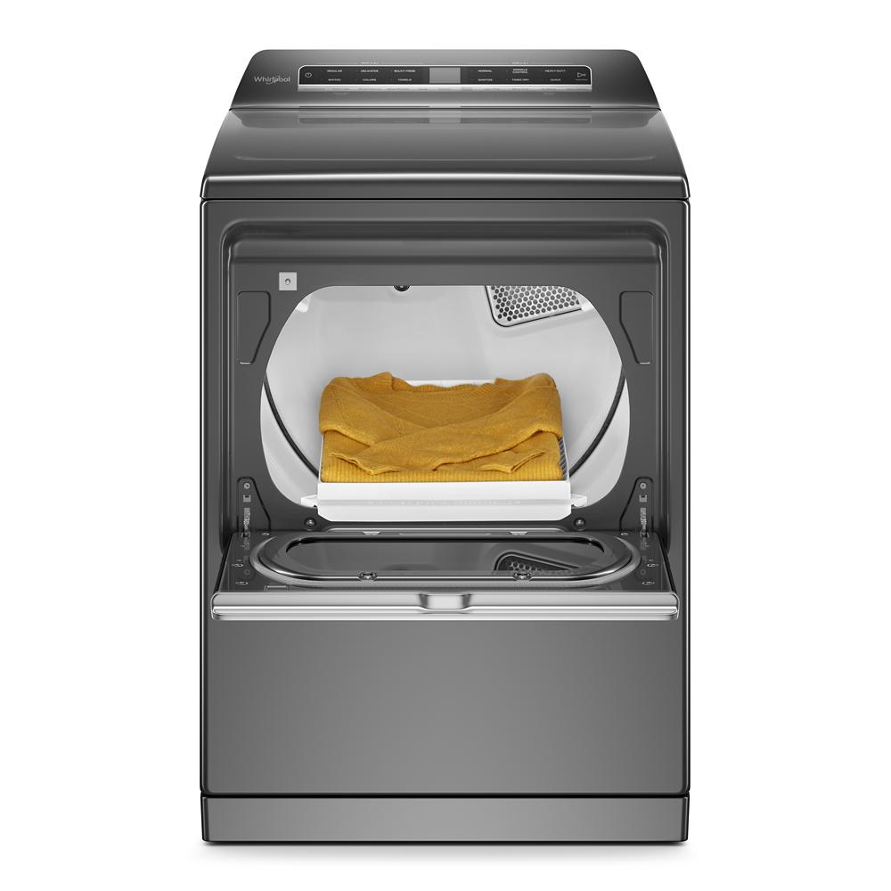 Dark gray top load gas dryer with advanced moisture sensing and open door showing yellow folded towel inside Dryer collection