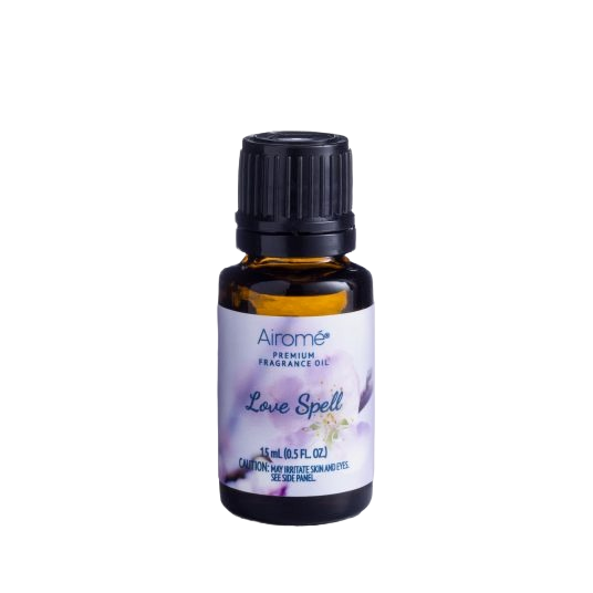Amber glass bottle of Airome Love Spell fragrance oil with black cap for personal scent use