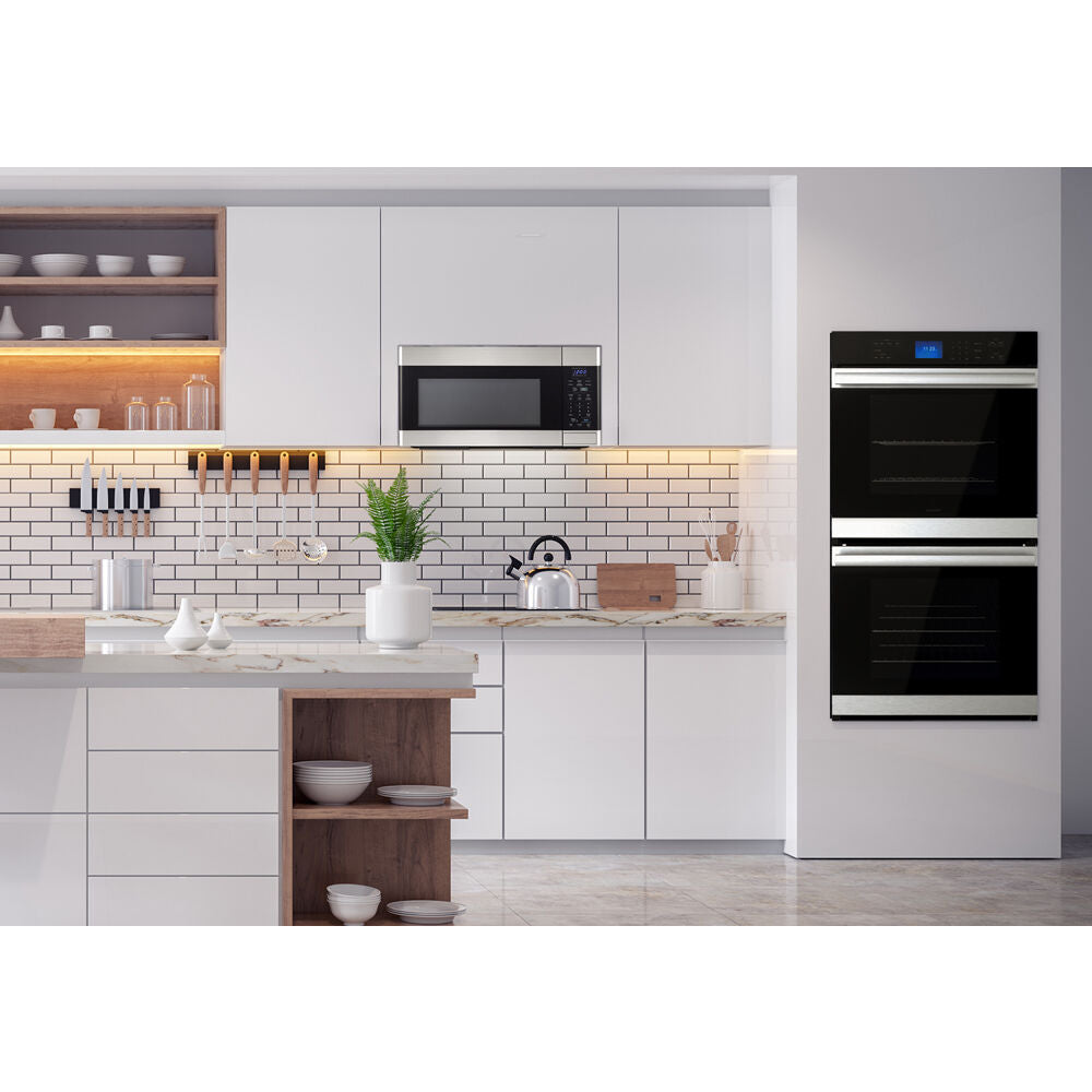 Modern kitchen featuring built-in black glass double wall oven with digital display and white cabinetry in appliances collection