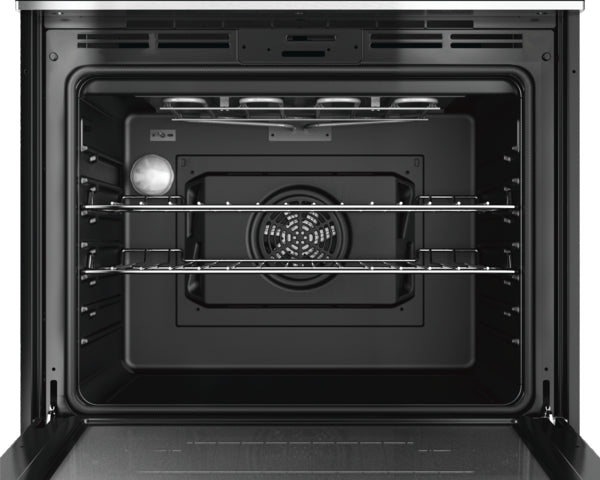 Interior view of stainless steel 30-inch single wall oven featuring dual racks and convection fan in kitchen appliances collection