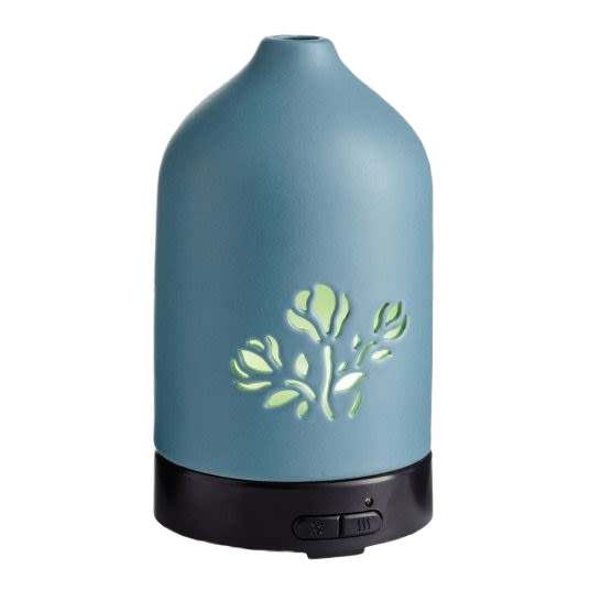 Blue ultrasonic essential oil diffuser with floral cutout design for home decor and relaxing ambiance under $50