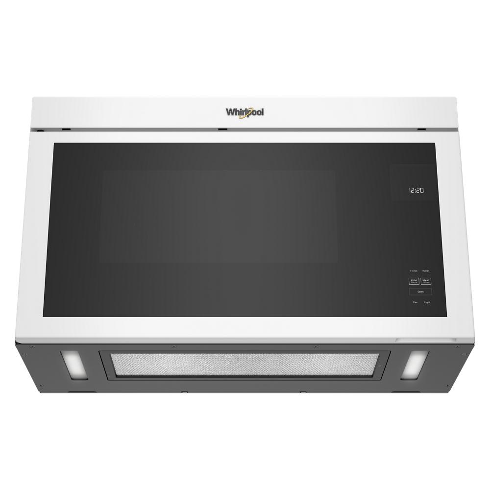 White Whirlpool flush mount microwave with sleek digital display and vent lights for kitchen appliances collection