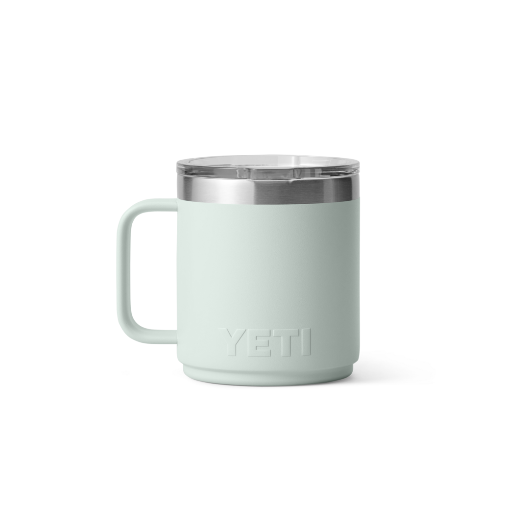 Light green insulated stackable mug with ceramic lining and clear lid for hot and cold drinks in drinkware collection