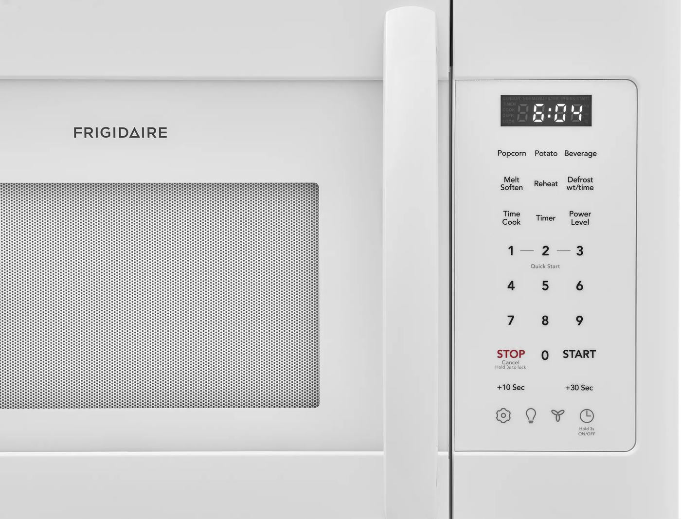 Close-up of white over-the-range microwave control panel with digital clock and touch buttons in kitchenware collection
