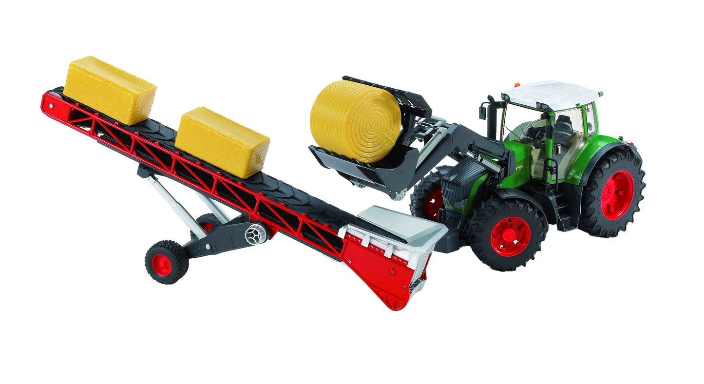 Green toy tractor with red wheels attached to Bruder 02031 Conveyor Belt carrying yellow toy hay bales in Vehicles & Remote Controlled Toys collection