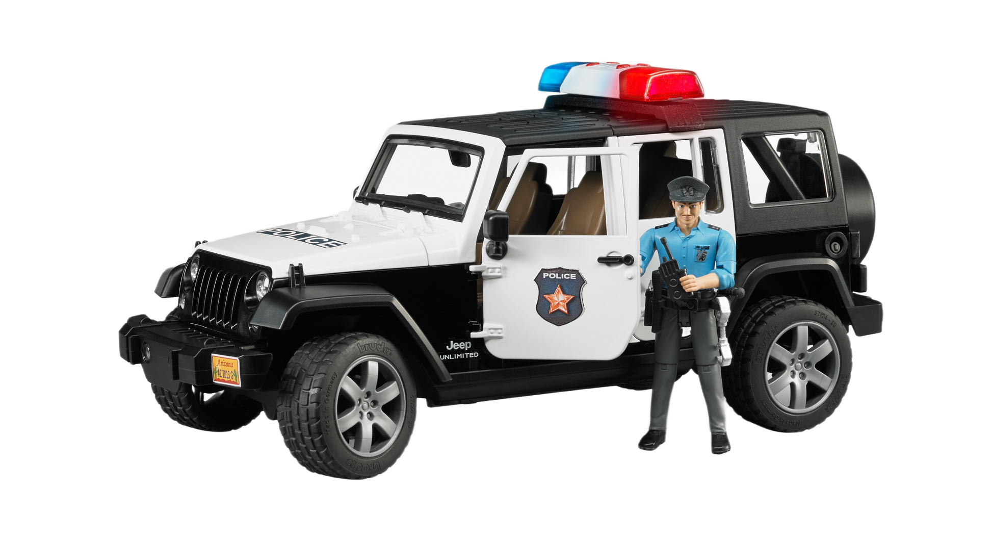 Black and white toy Jeep Wrangler police vehicle with roof light bar and policeman figure holding walkie talkie accessory