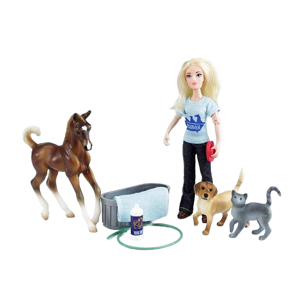 Doll in light blue shirt with horse, dog, cat figures, grooming brush, towel, shampoo bottle, and hose toy set