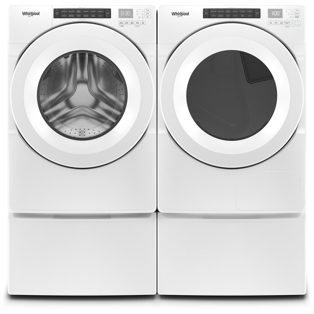 White front-load washer and heat pump dryer set with digital displays and touch controls in laundry appliance setting