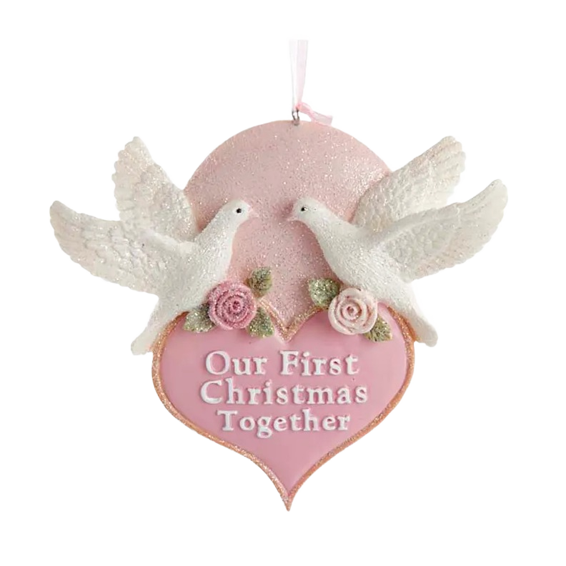 Pink heart ornament with white doves, floral details, and "Our First Christmas Together" text for holiday decor under $50
