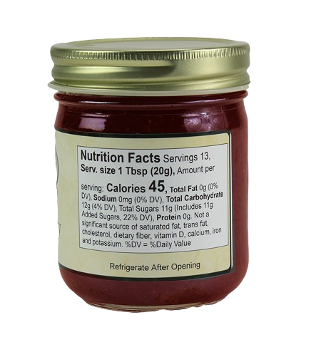 Glass jar of Hartville Kitchen strawberry jam showing nutrition facts label under $50 food and beverage collections
