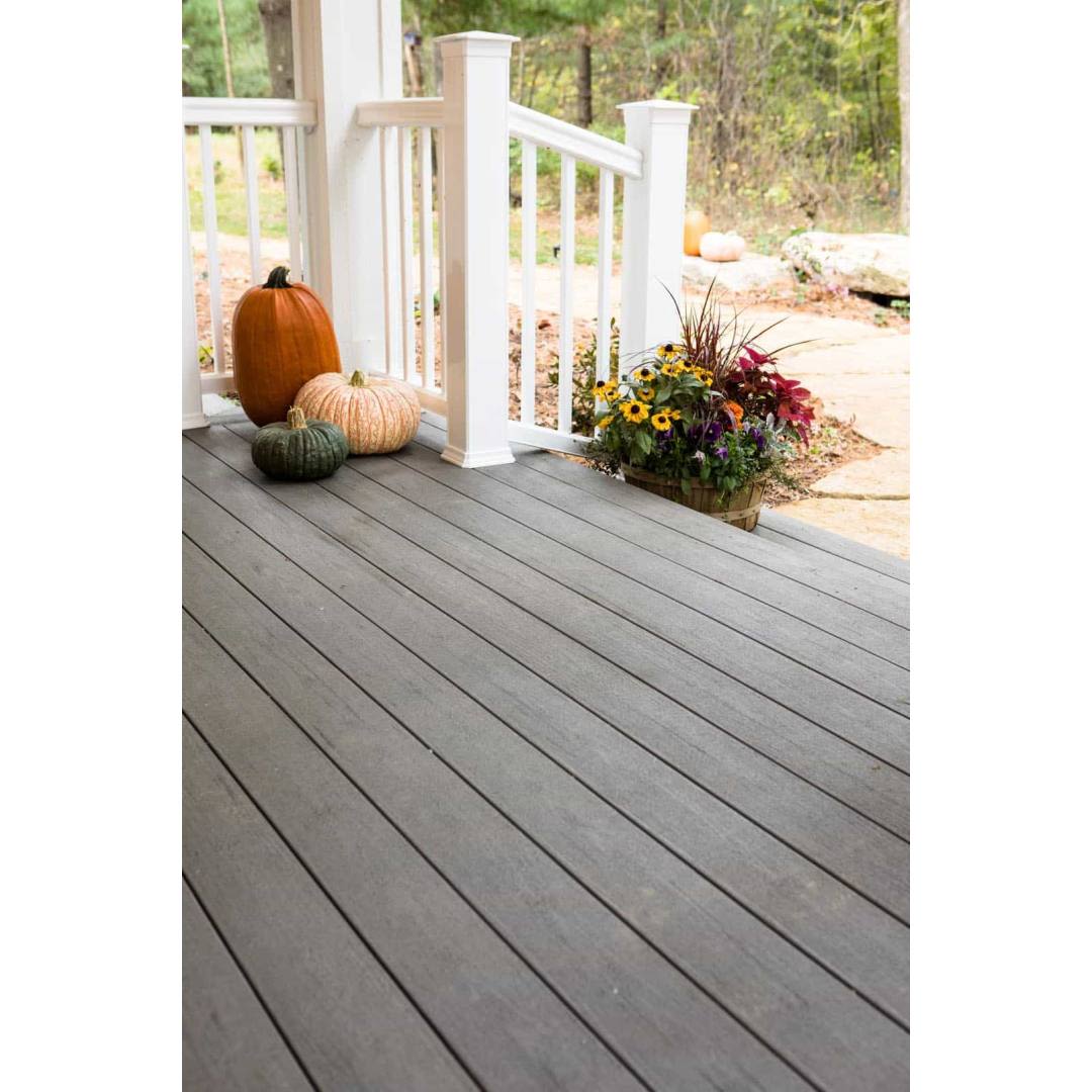 Outdoor porch deck featuring grooved Silver Maple composite boards from TimberTech PRO Terrain collection with autumn decor