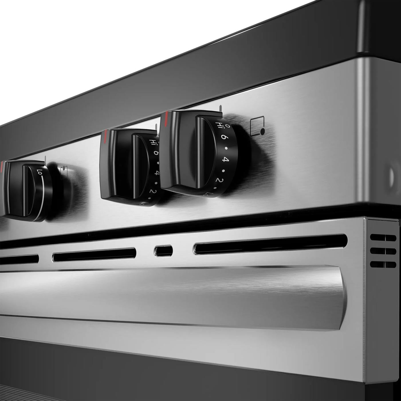 Close-up of stainless steel electric range control knobs and door handle in Ranges & Cooktops collection