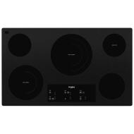 Black ceramic glass cooktop with five radiant elements and digital touch controls in kitchen appliances collection