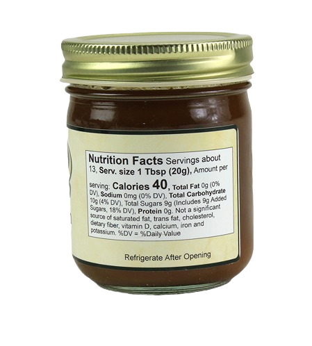 Glass jar of Hartville Kitchen Pumpkin Butter with gold metal lid showing nutrition facts label in Jams & Jellies collection