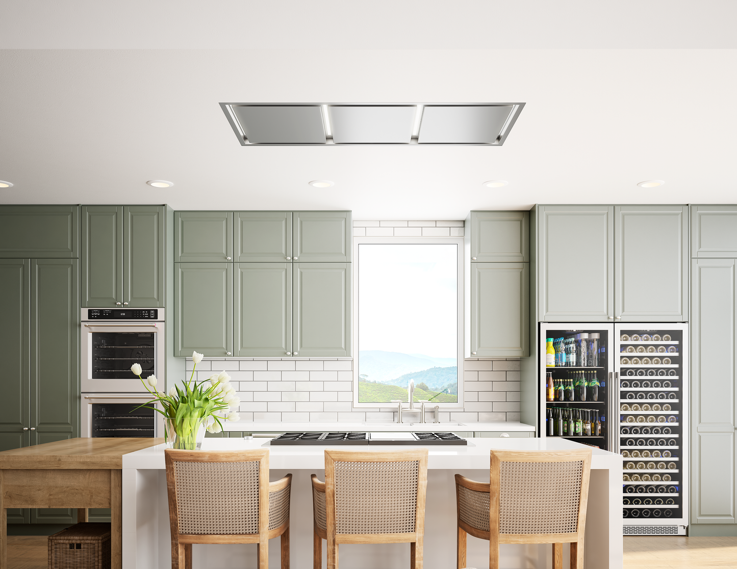 Modern kitchen interior featuring a stainless steel ceiling-mounted range hood, light green cabinetry, built-in ovens, and an island with seating, part of Range Hoods, Kitchen & Kitchenware, All Products, and Appliances collections.