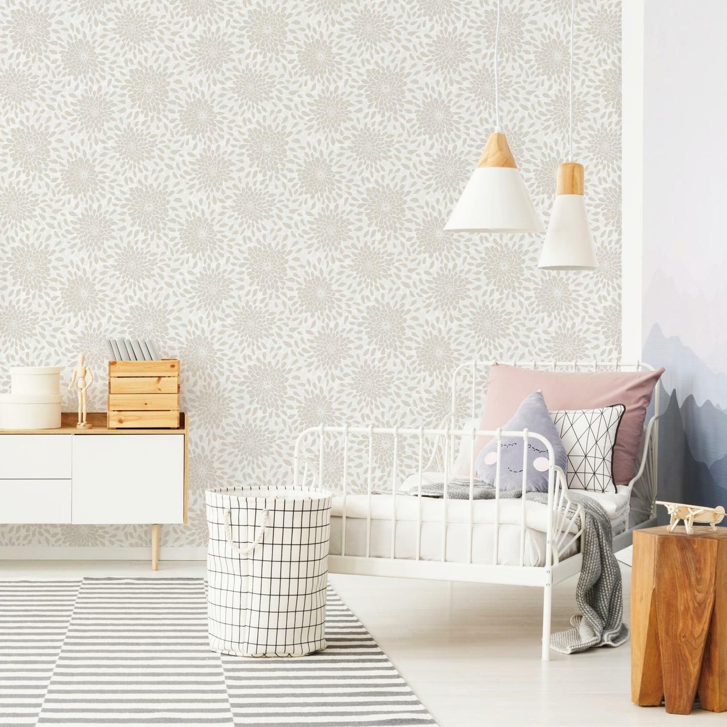 Modern bedroom corner with neutral floral peel and stick wallpaper and minimalist white metal bed frame