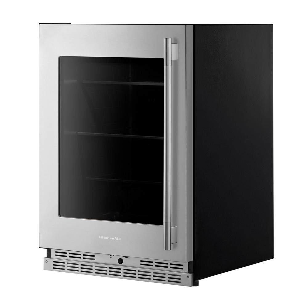 24-inch undercounter refrigerator with stainless steel frame, glass door, and metal-accented shelves from KitchenAid Appliances
