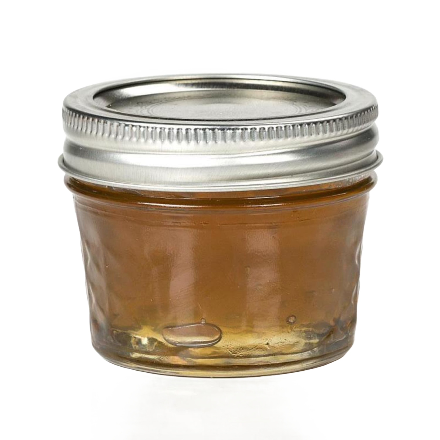 Clear glass jar filled with amber jelly, metal lid for kitchenware and home food storage under $50 collection