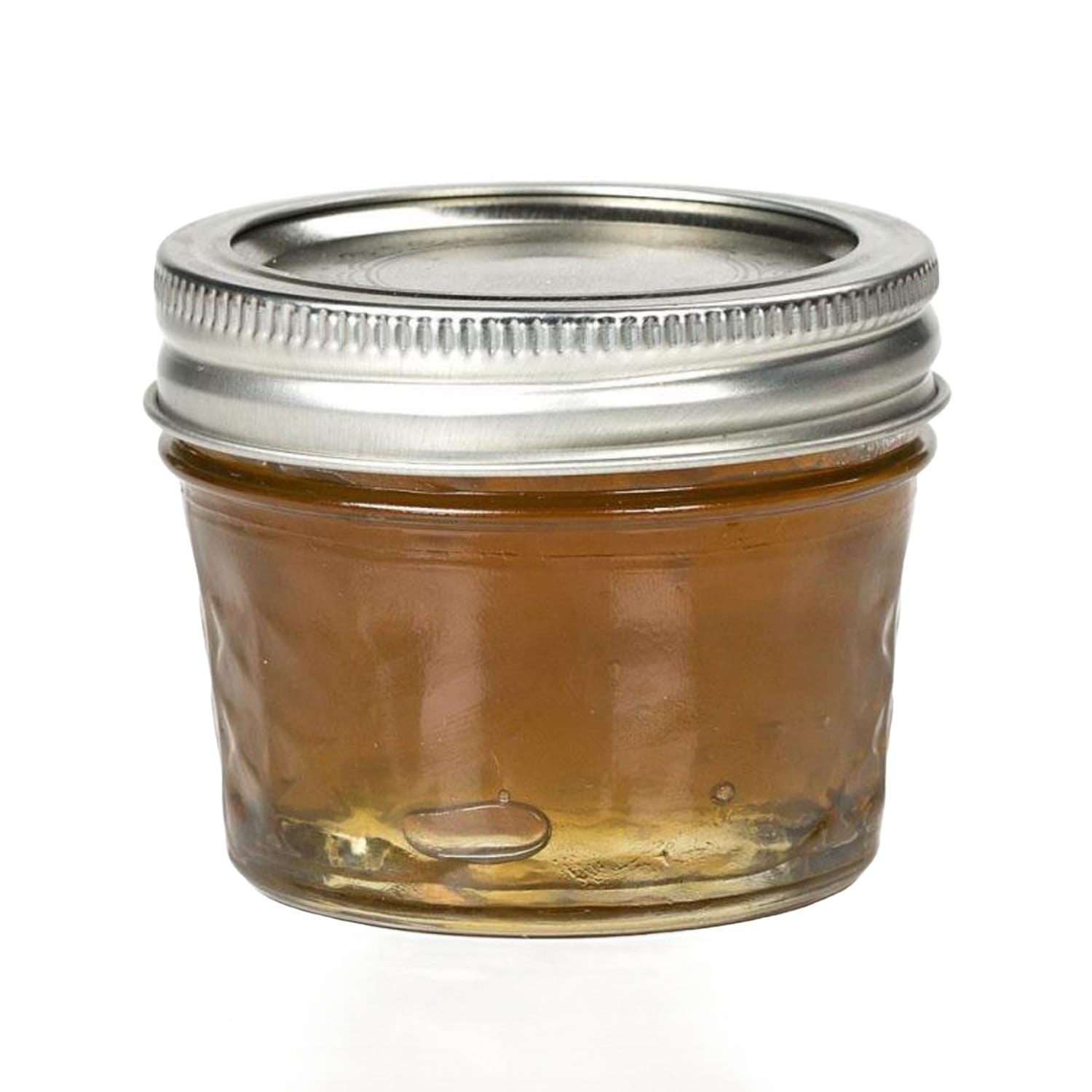 Clear glass jar filled with amber jelly, metal lid for kitchenware and home food storage under $50 collection