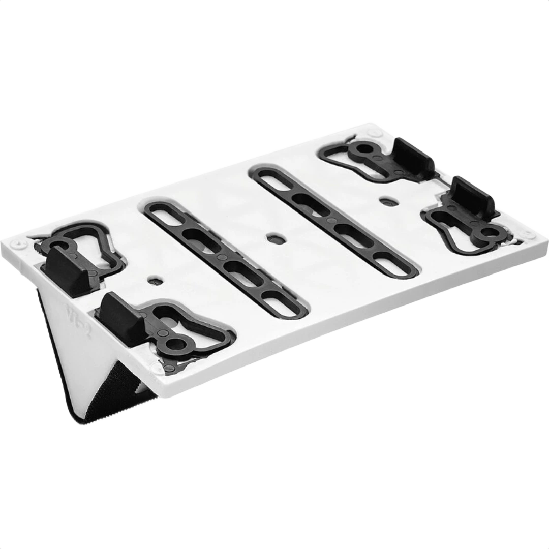 White and black convex sanding pad with attachment clips for woodworking tool accessories and home improvement use