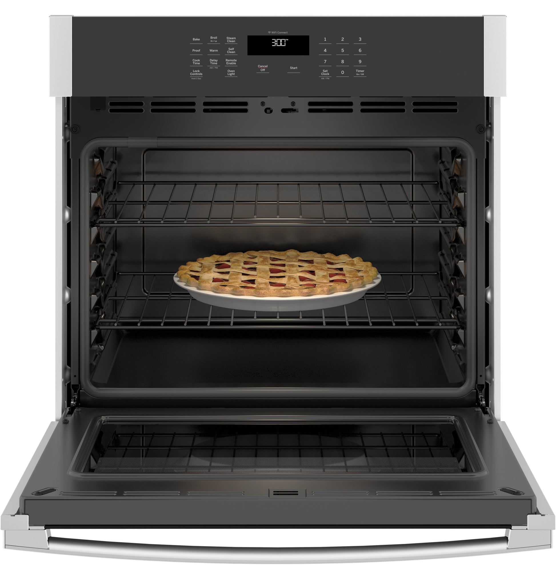 Open built-in wall oven with digital controls baking a lattice-topped pie inside the single wall ovens collection
