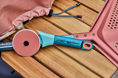 Limited edition pizza cutter with turquoise handle and terracotta wheel for precision slicing in home kitchens