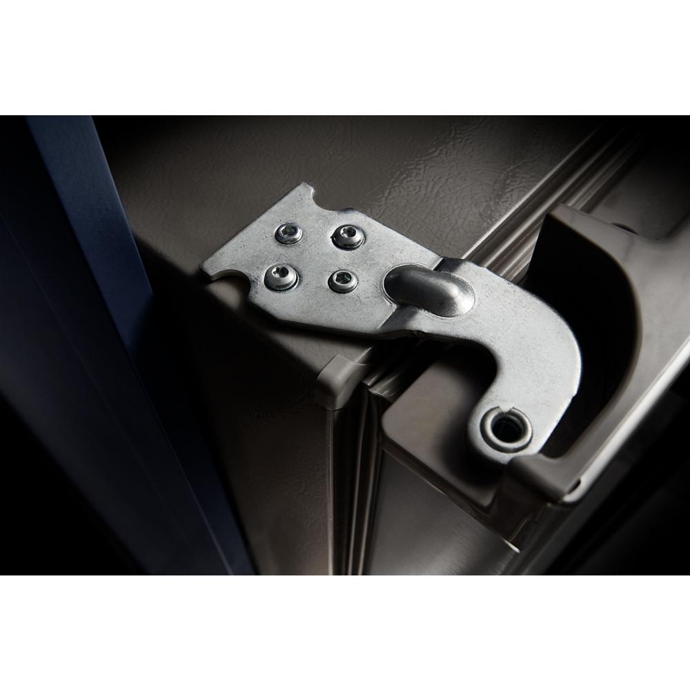 Close-up of metal hinge attached to the door of a side-by-side refrigerator in Kitchen & Kitchenware collection