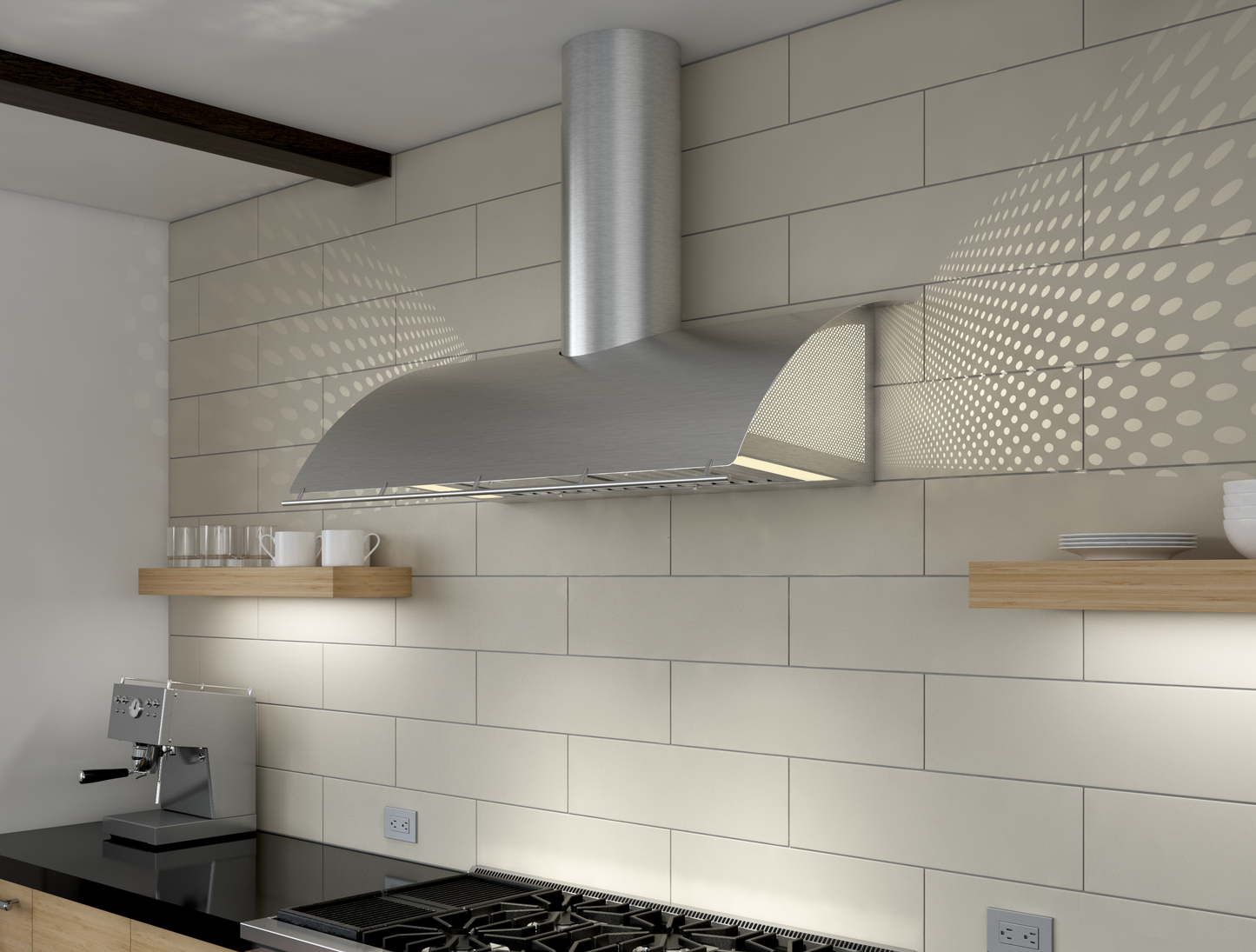 Stainless steel wall-mounted range hood with perforated side panels installed above a gas cooktop in kitchen setting