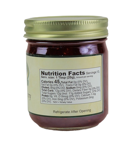 Back view of Hartville Kitchen red raspberry jam jar with nutrition facts and gold metal lid from Jams & Jellies collection