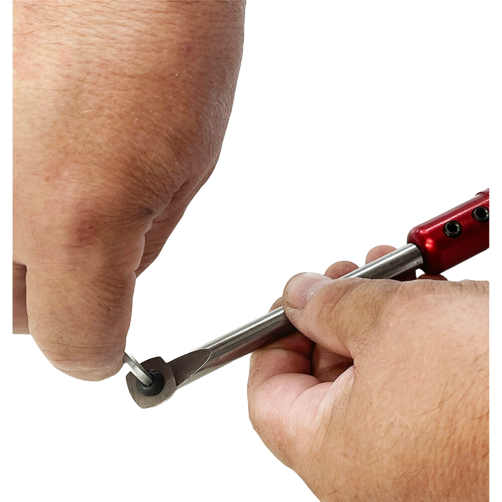 Hands adjusting red and steel Sorby micro resin pen turning tool in woodworking tools under $100 collection