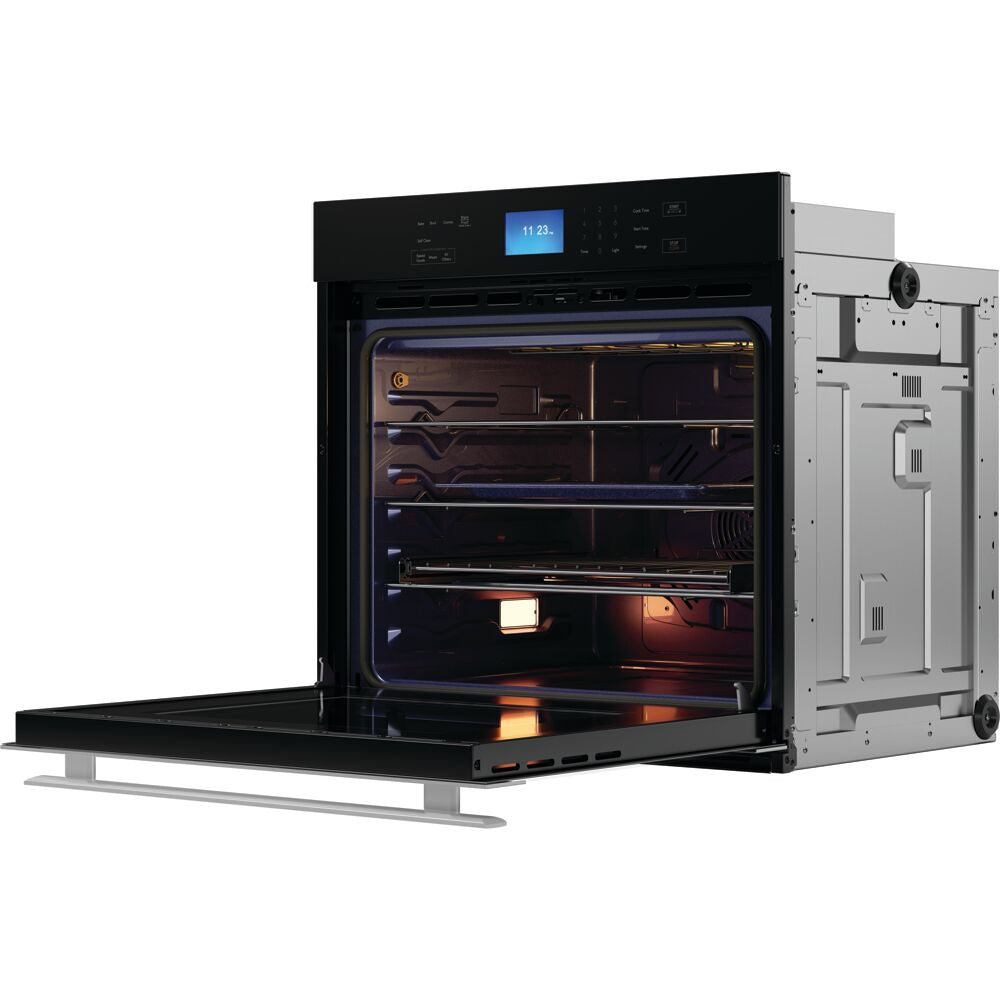 Open built-in electric wall oven with black glass front, stainless steel frame, interior light, and digital display from kitchen appliances collection