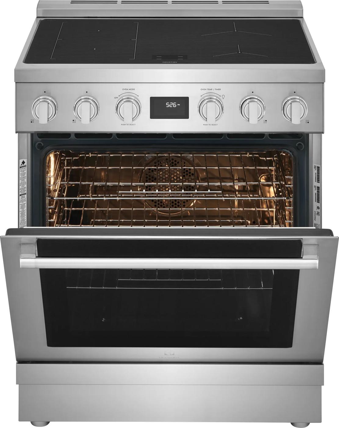 Front view of stainless steel 30" induction freestanding range with open oven door and control knobs in ranges collection