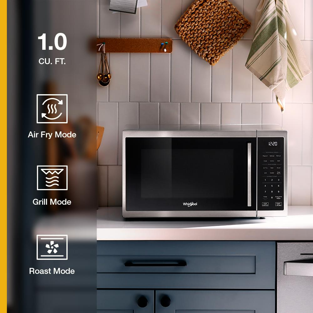 Stainless steel multifunctional countertop microwave with digital panel and Air Fry, Grill, and Roast modes on kitchen counter