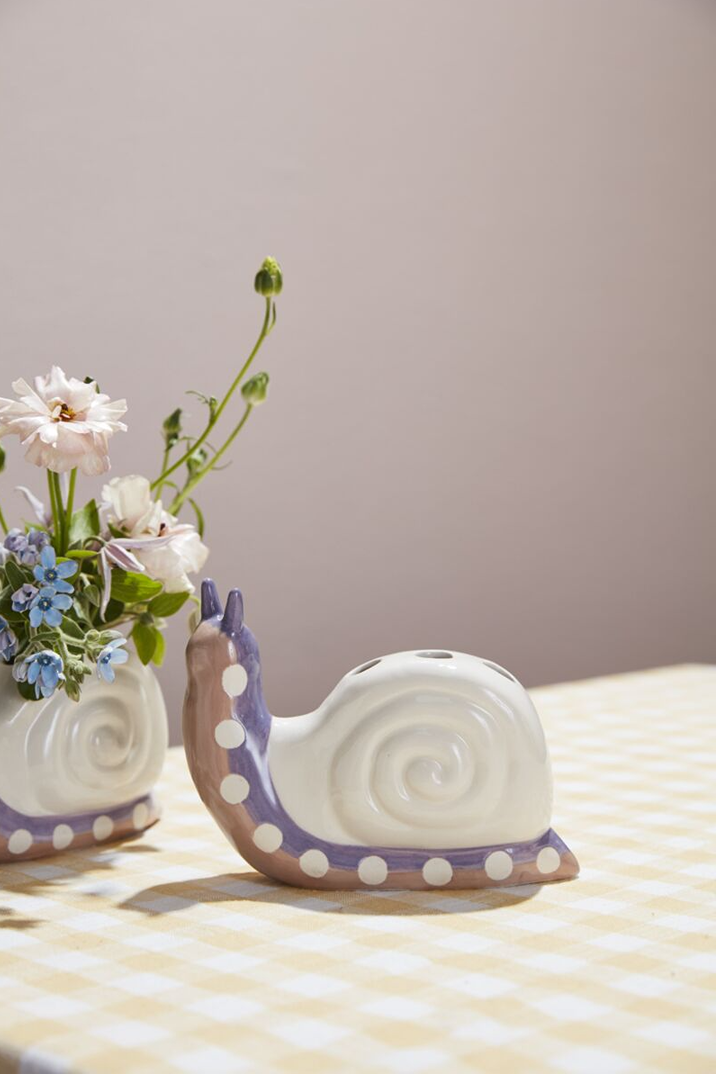 Ceramic snail-shaped bud vase with white and lavender accents for charming tableware and kitchen décor under $50 collection
