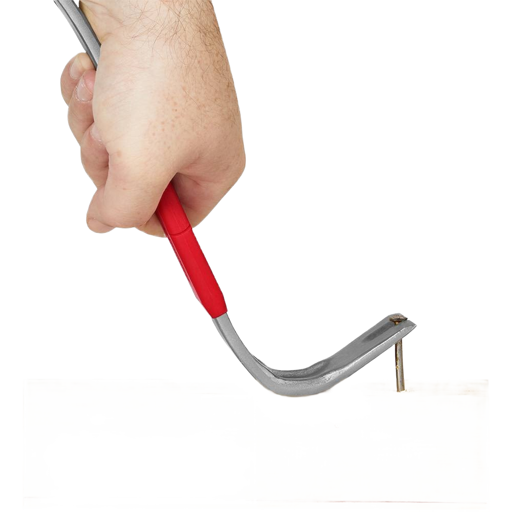 Hand gripping Milwaukee 12" pry bar with red handle lifting nail from light wood surface for home improvement tasks