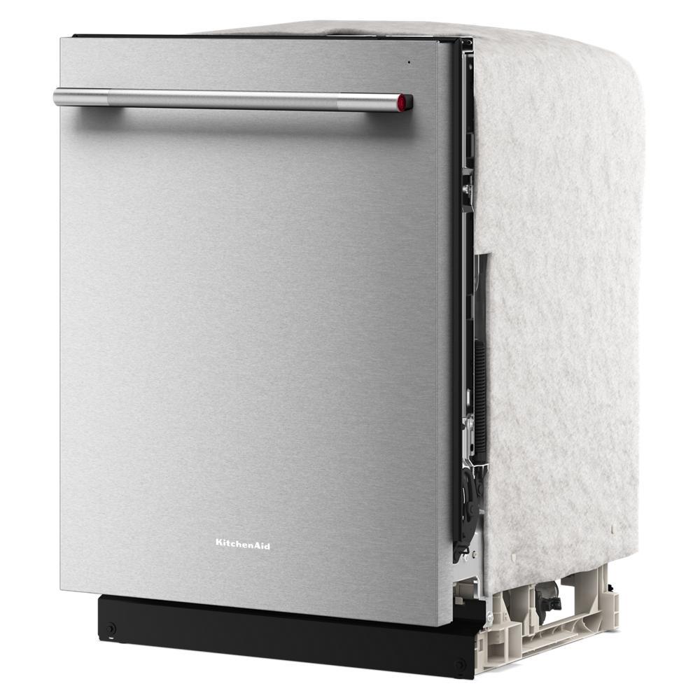 Partially assembled stainless steel dishwasher with towel bar handle and insulation wrap for KitchenAid appliance collection