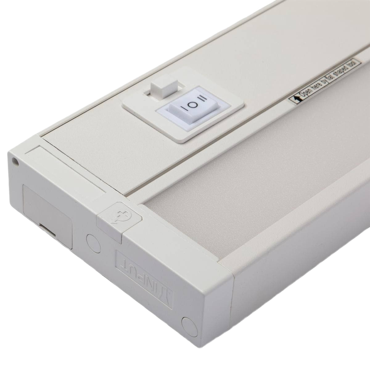 Close-up of white under cabinet LED light with toggle switch for easy control in electrical and cabinet lighting collections