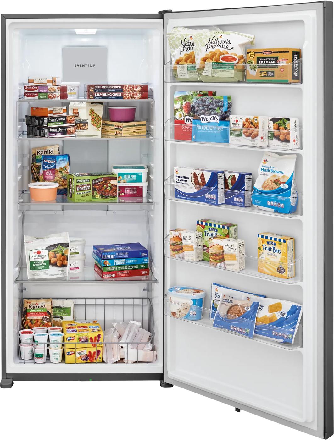 Open black upright freezer showing organized frozen food items on shelves and door compartments from Freezers & Ice Makers collection