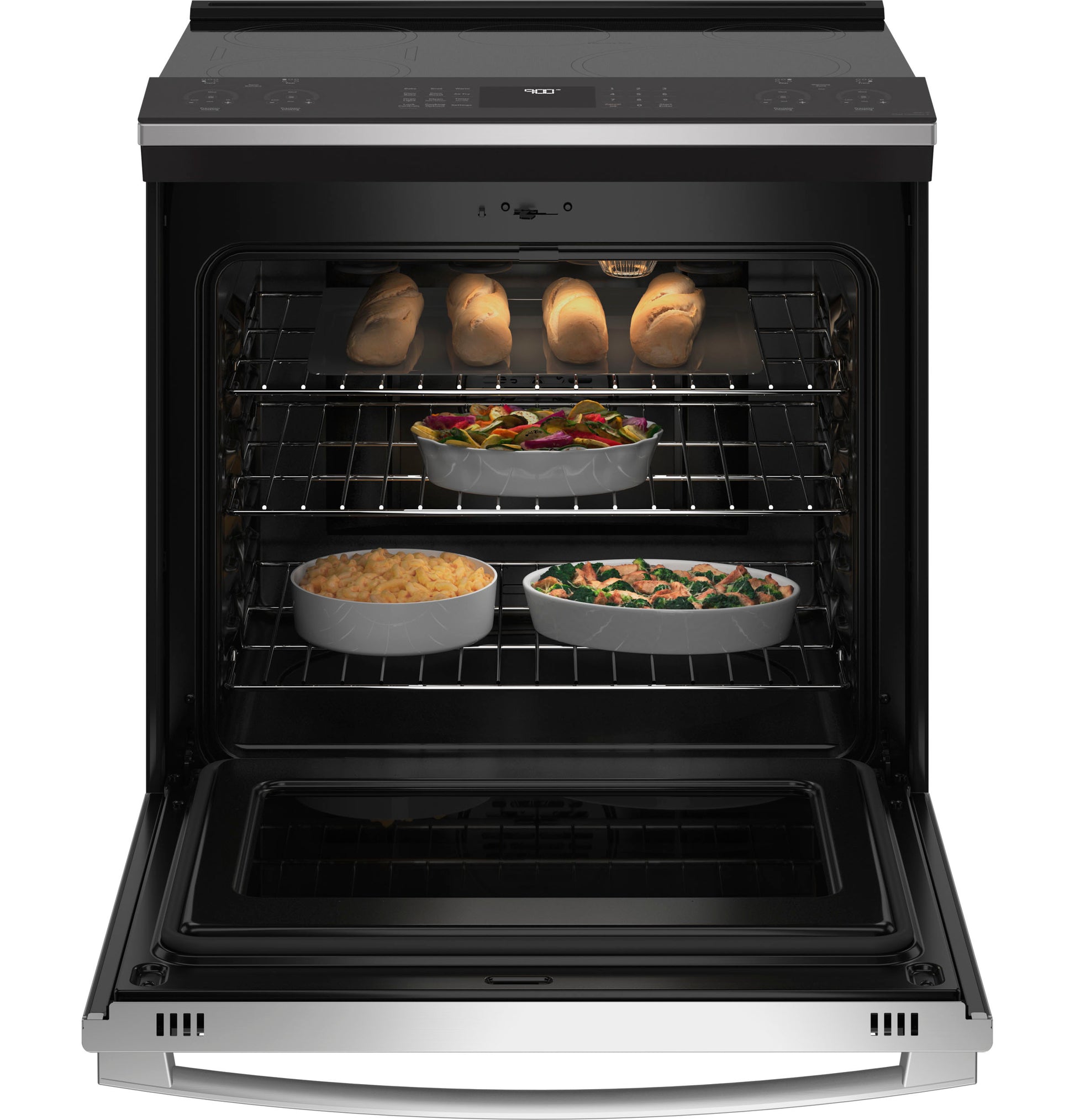 Open stainless steel slide-in induction and convection range oven with multiple dishes inside from Ranges collection