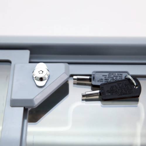 Close-up of lock and keys on glass top freezer, featured in Refrigerators and Appliances collections