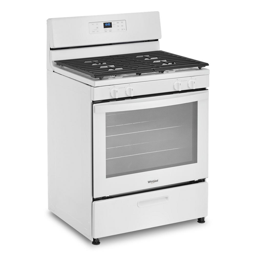 White freestanding gas range with digital display, broiler drawer, and four burner grates in kitchen appliances collections