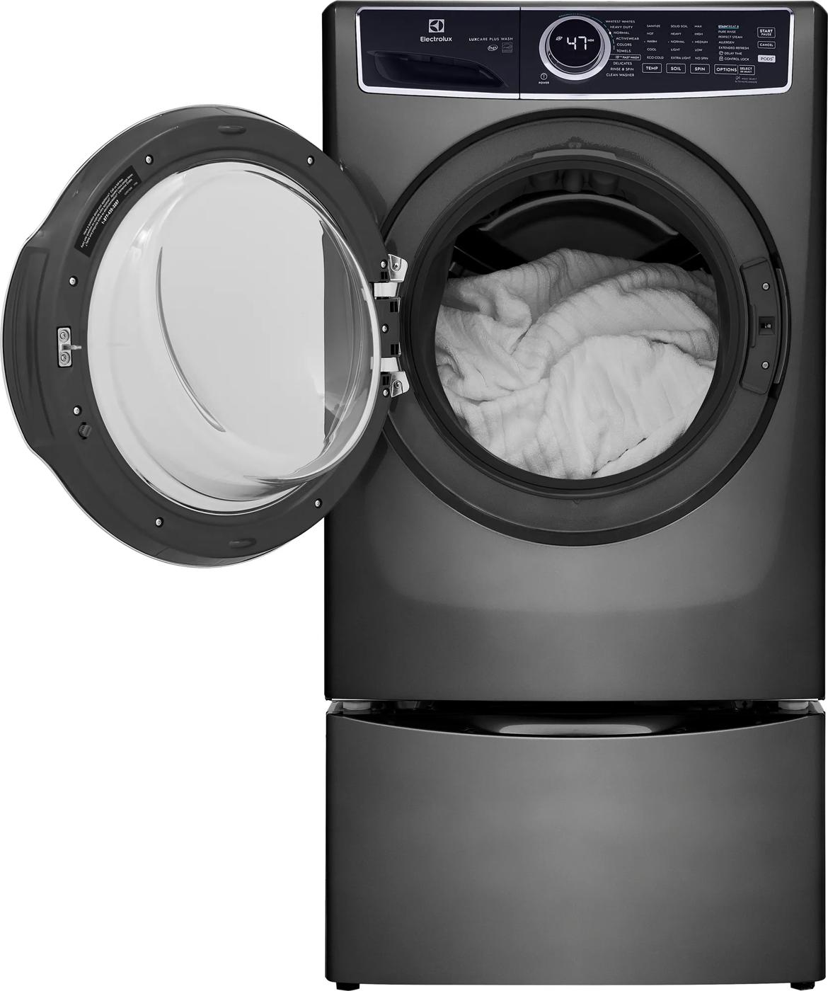 Matte gray front load washer with open door, digital controls, and blanket inside in washers and appliances collection