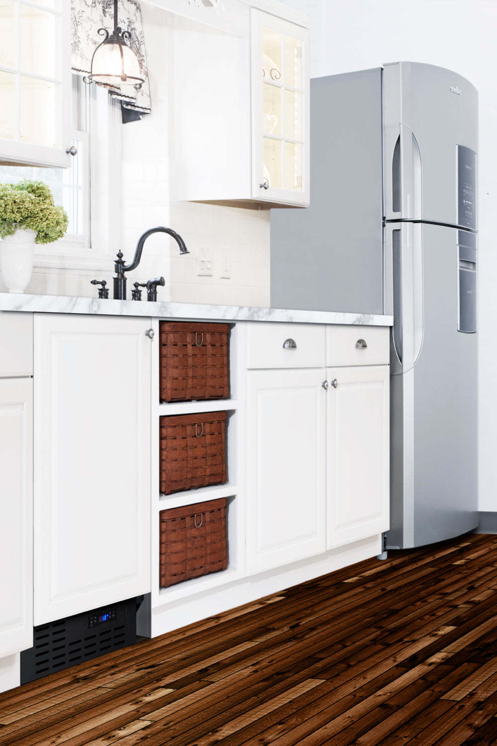 Black built-in frost-free all-freezer with blue digital display under white kitchen cabinets from Freezers & Ice Makers collection