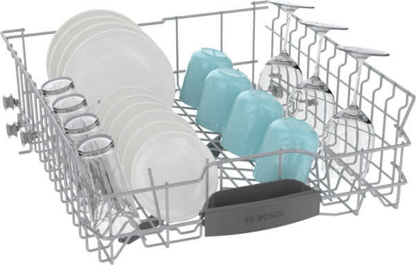 Dishwasher rack loaded with white plates, clear glasses, and teal mugs from Bosch Appliances collection