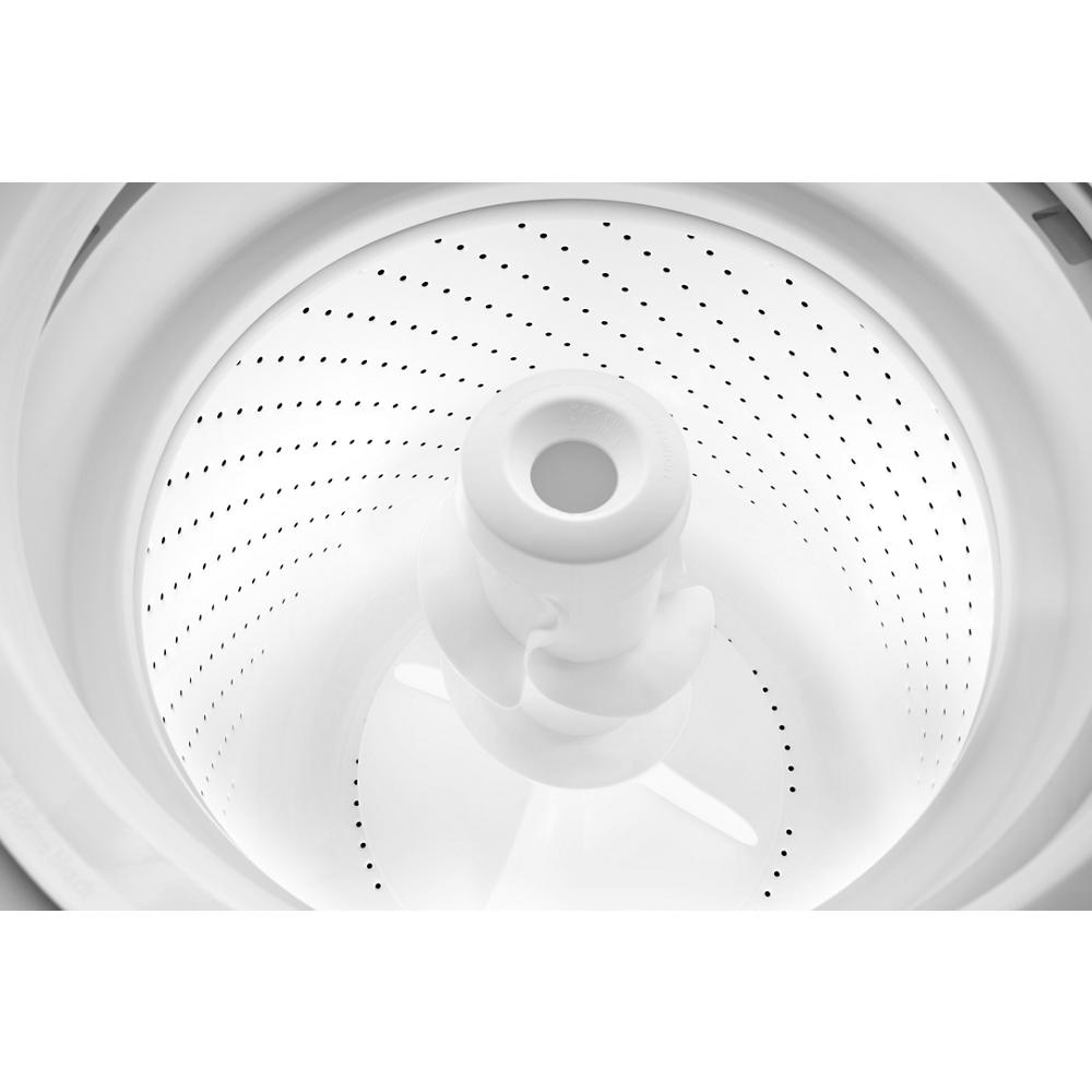 Top load washer drum with central agitator and perforated stainless steel basket in appliance laundry centers at Hartville Hardware.