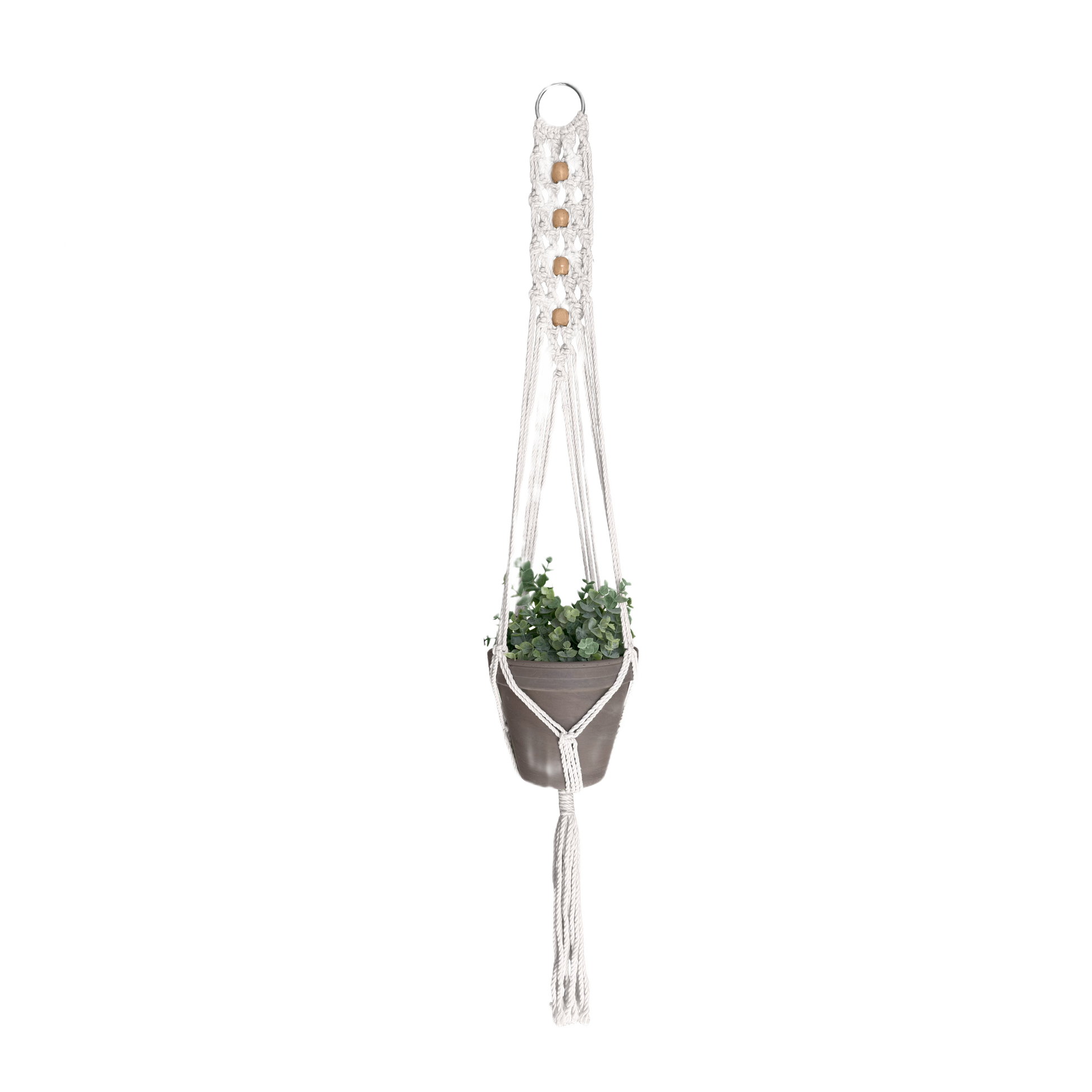 Handcrafted natural cotton macrame plant hanger with wooden beads holding a small green potted plant for home accents and decor.