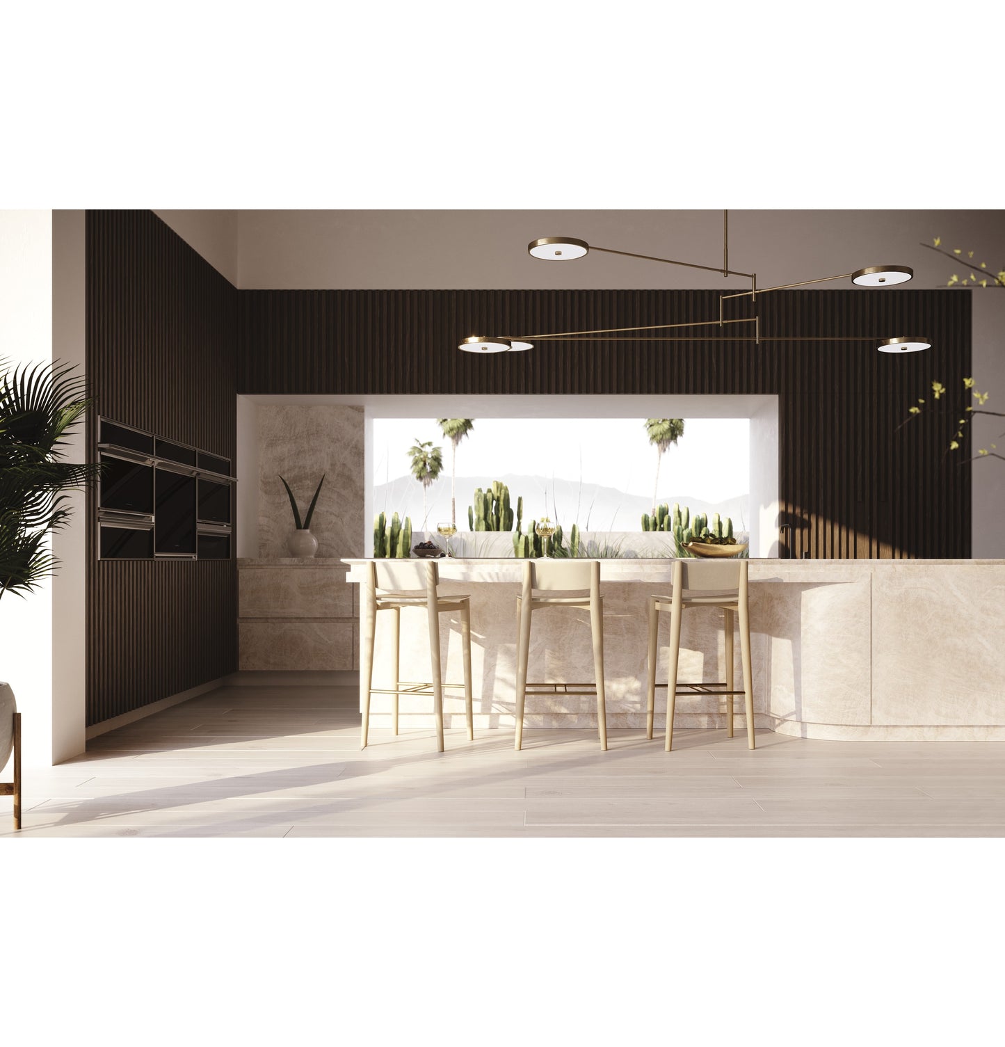 Modern kitchen featuring built-in ovens, marble island with stools, and floor-to-ceiling window with cactus view in appliances collection