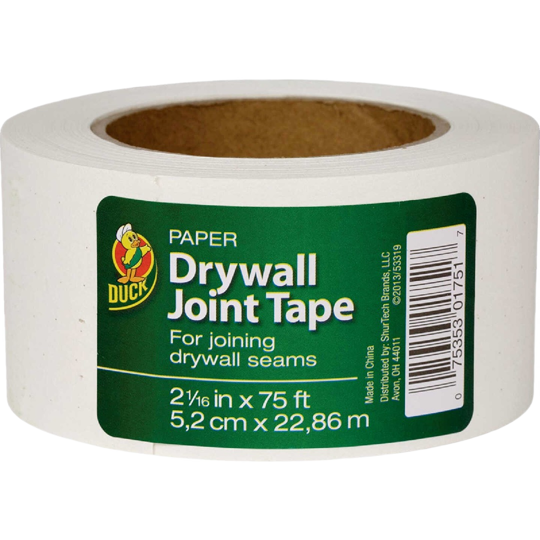 Roll of paper drywall joint tape with green label for joining drywall seams in home improvement projects
